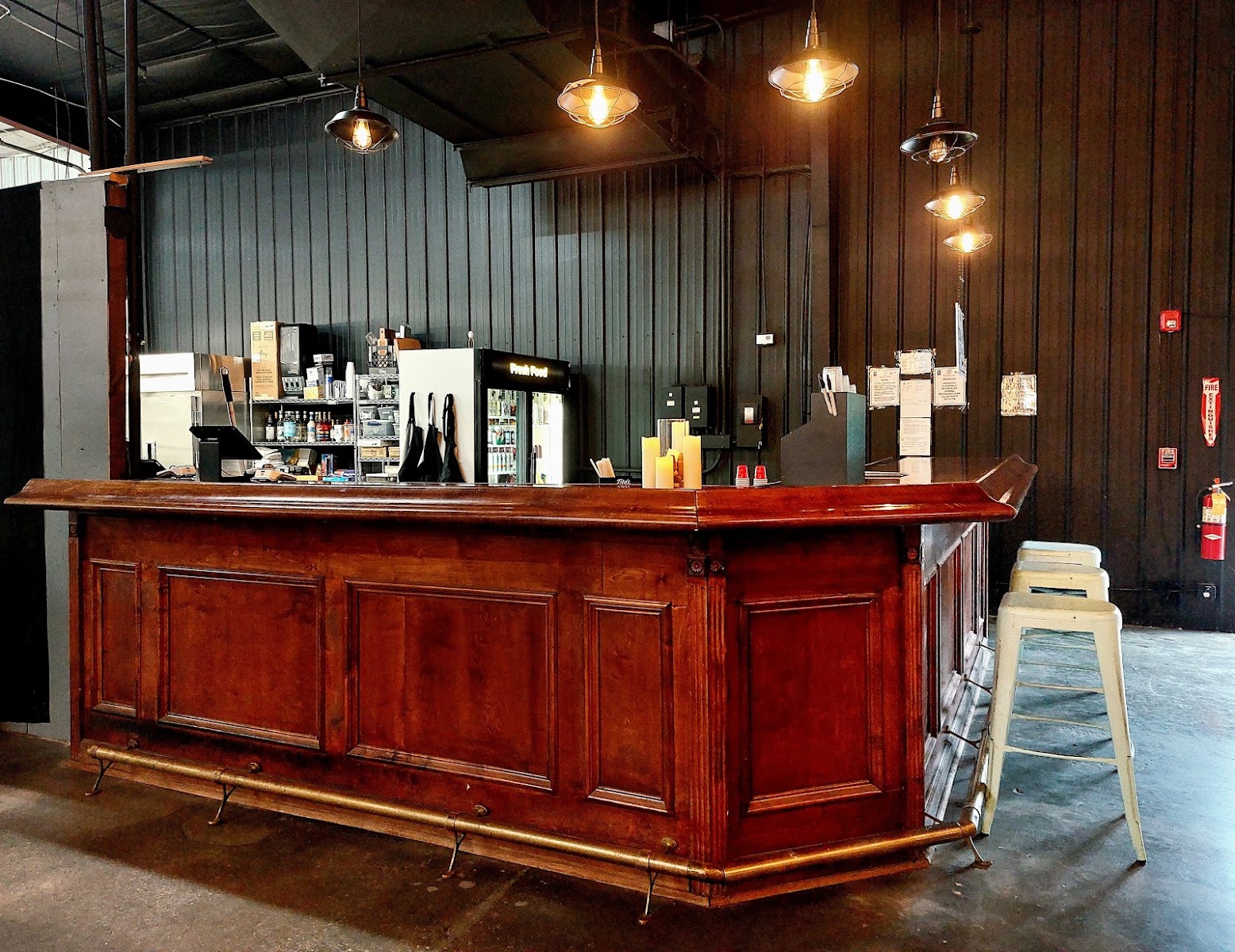 The wood bar prepared for an event at The Dallas Markets